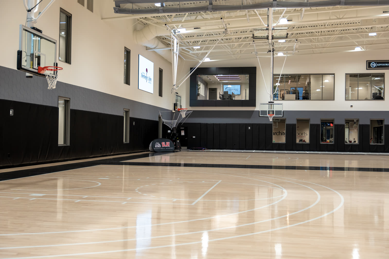 Indoor training court with partner branding